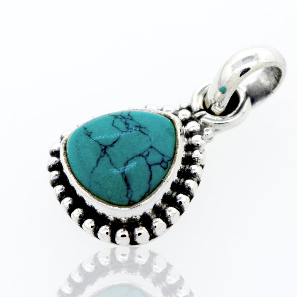 
                  
                    A Super Silver Beautiful Triangular Shape Turquoise Pendant With Beads Design.
                  
                
