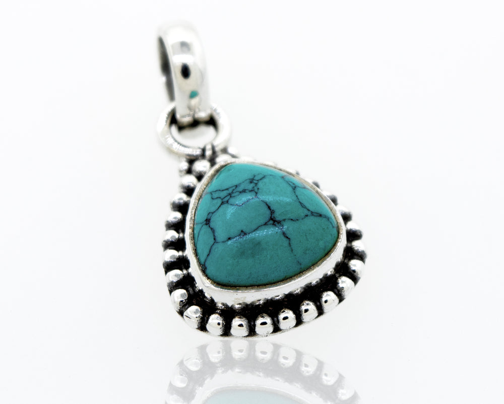 A Super Silver beautiful triangular shape turquoise pendant with beads design.