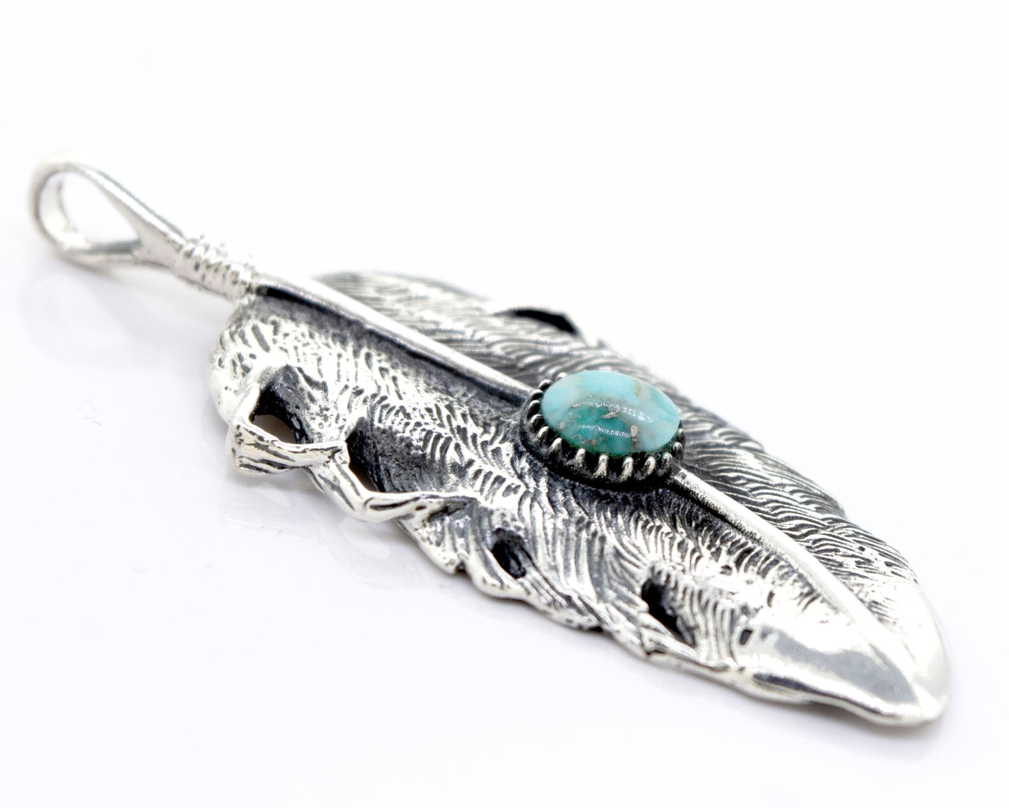 
                  
                    The Super Silver Native Inspired Feather Pendant With Turquoise adorns this sterling silver feather design pendant.
                  
                