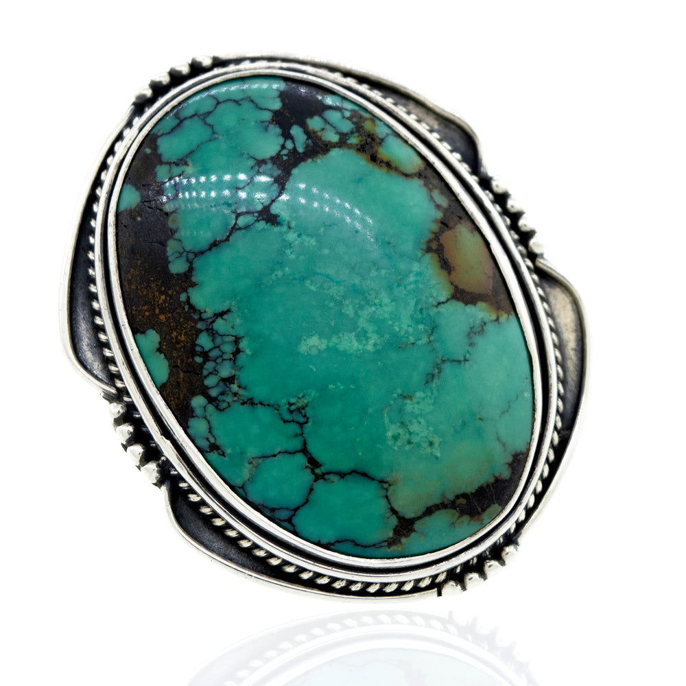 A Oval Natural Turquoise Ring With Rope And Ball Border by Super Silver with a natural turquoise stone.