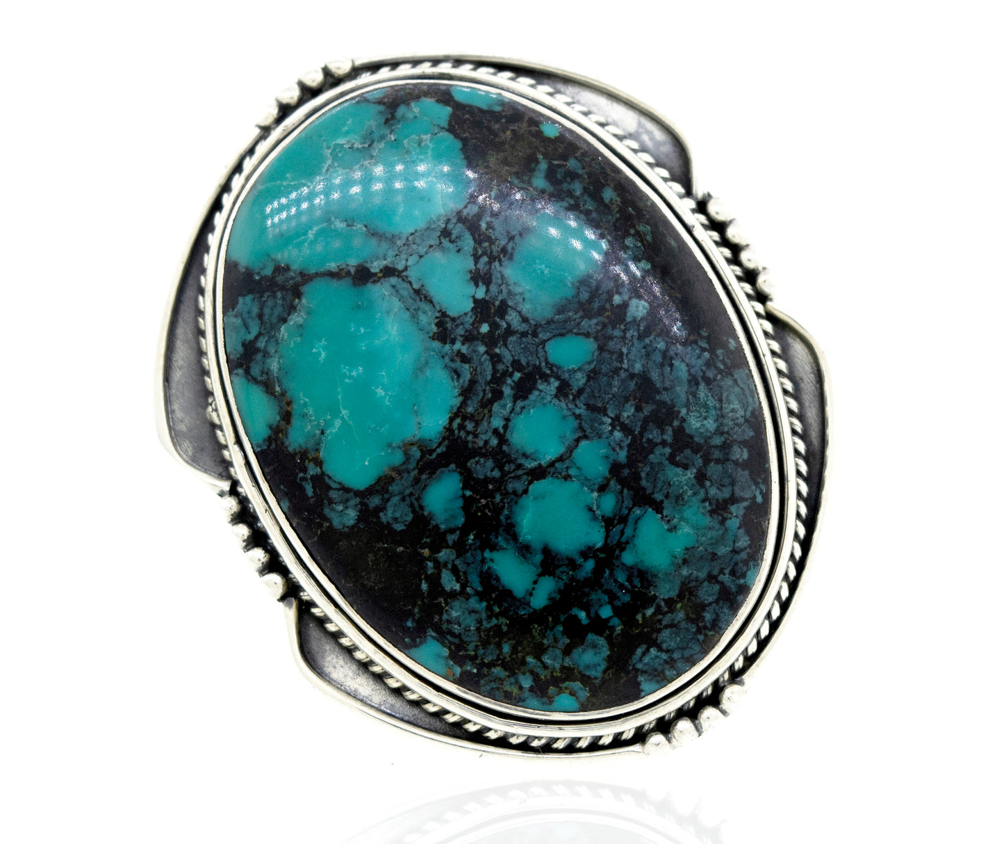 A sparkling Super Silver sterling silver ring with an Oval Natural Turquoise Ring With Rope And Ball Border.