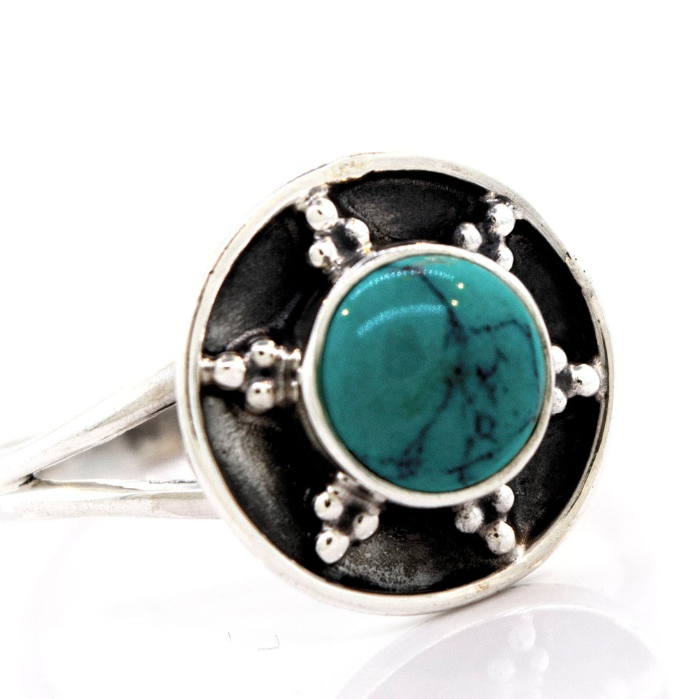 A Turquoise Ring With Unique Oxidized Silver Design from Super Silver.