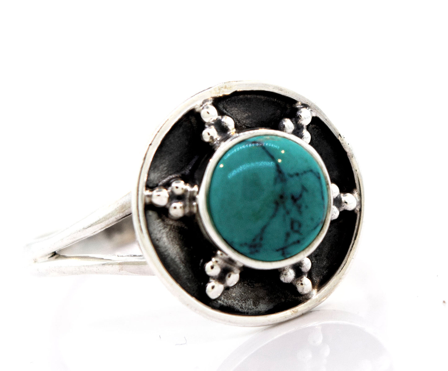 A Turquoise Ring With Unique Oxidized Silver Design from Super Silver.
