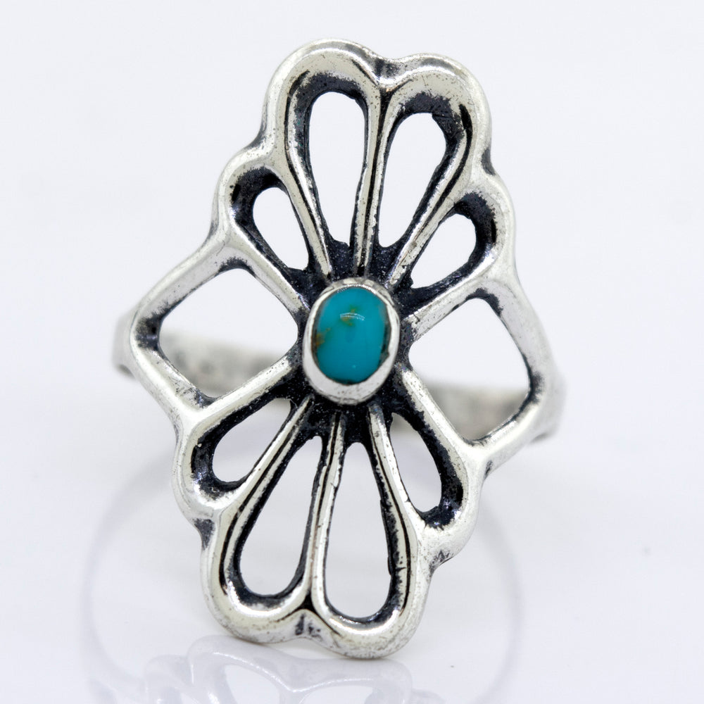 
                  
                    A Super Silver American Made Flower Ring with an oval turquoise stone.
                  
                