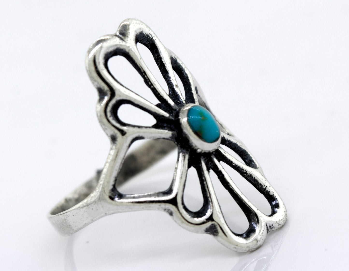 
                  
                    A handcrafted Super Silver American Made Flower Ring with an oval turquoise stone.
                  
                