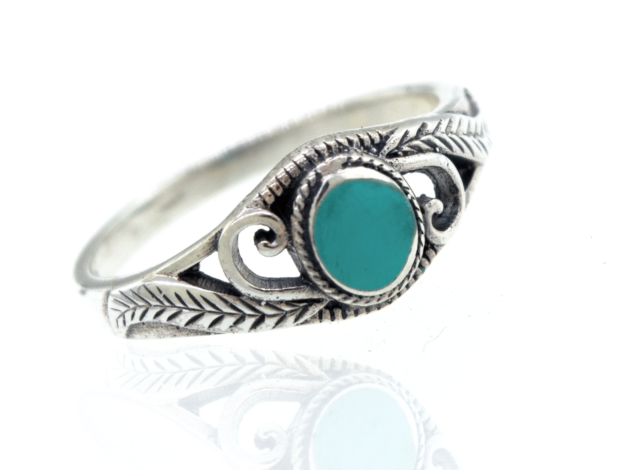 A sterling silver Turquoise Ring with Leaves and Swirls.