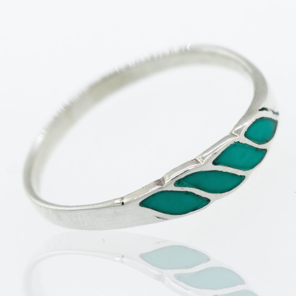 A Super Silver Turquoise Striped Ring With Four stripes with reconstituted turquoise stones.