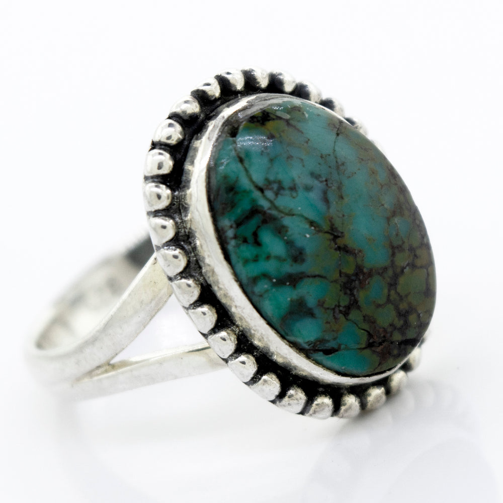 
                  
                    A Super Silver Oval Natural Turquoise Ring With Ball Border.
                  
                