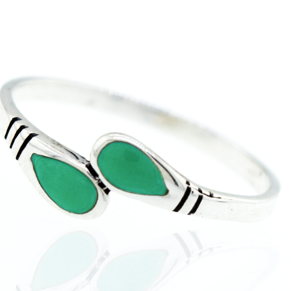 An elegant Super Silver Green Turquoise Teardrop Shape Ring with two turquoise stones.