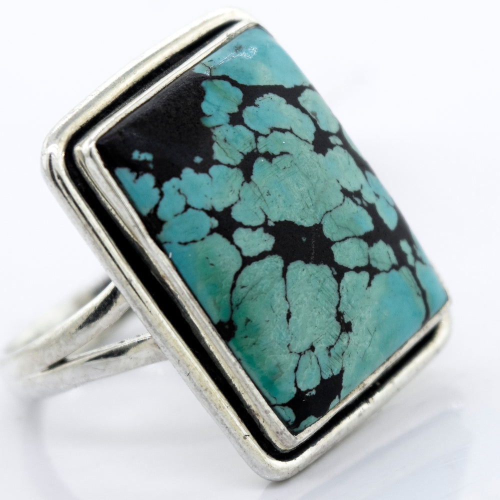 A Rectangular Natural Turquoise Ring With Plain Border by Super Silver.