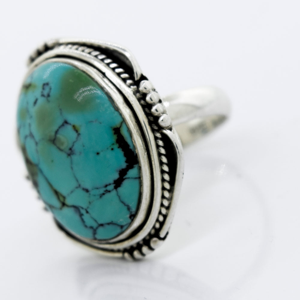 
                  
                    A Super Silver Natural Turquoise Ring With Rope Design.
                  
                
