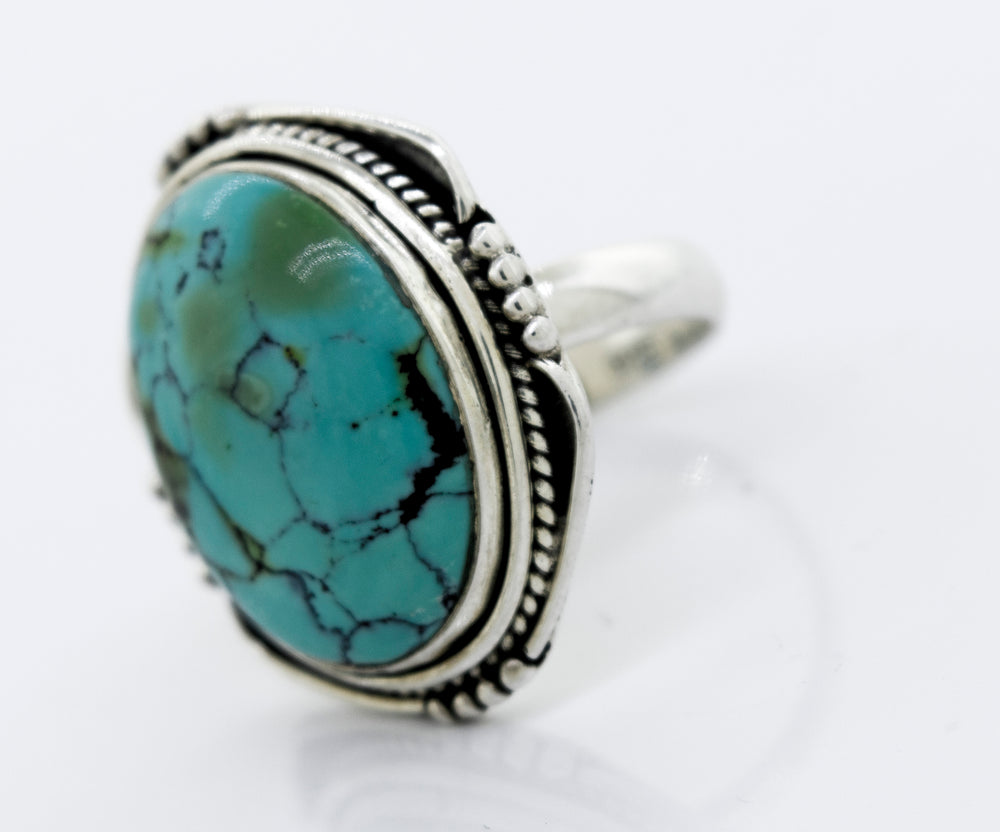 
                  
                    A Super Silver Natural Turquoise Ring With Rope Design.
                  
                