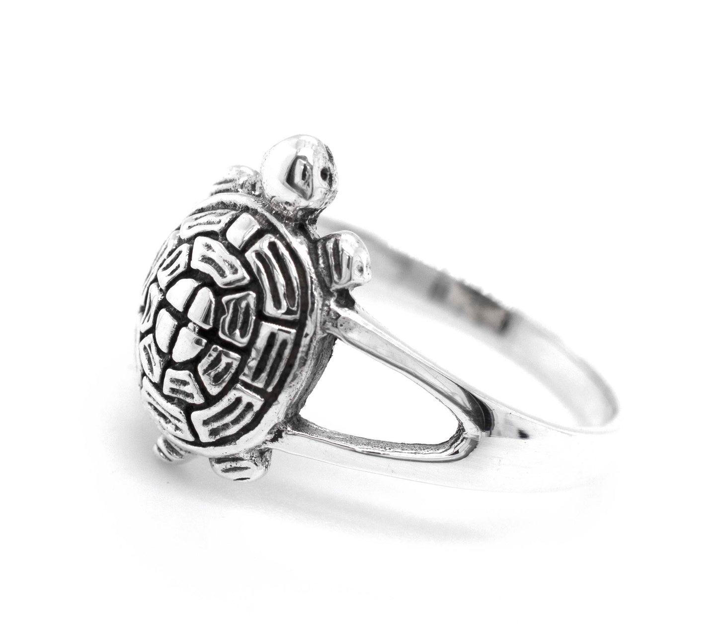 A reptile-inspired Turtle Ring on a white background.