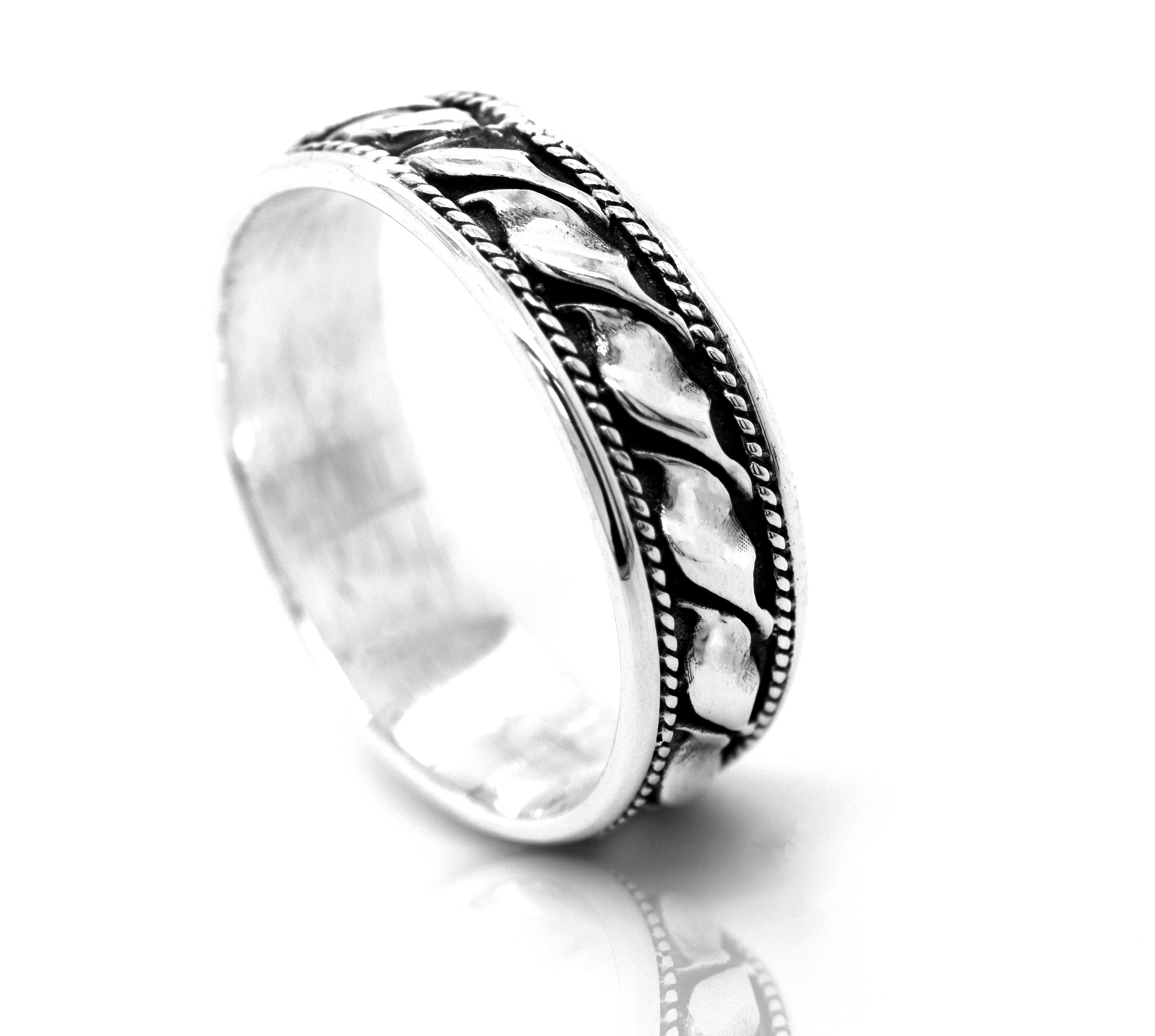 A Captivating Wavy Rope Band with a knot pattern on it.
