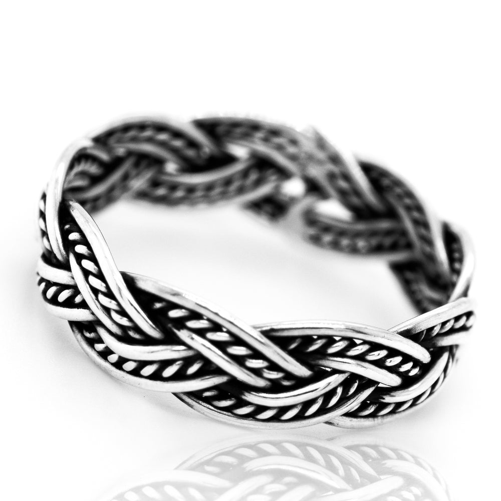 
                  
                    A Super Silver Twisting Rope Band, with a woven rope design, featuring texture and antiquing.
                  
                