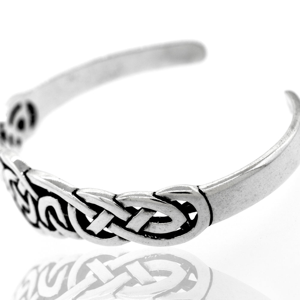 A Super Silver Celtic Knot Cuff bracelet with an unbreakable bond.