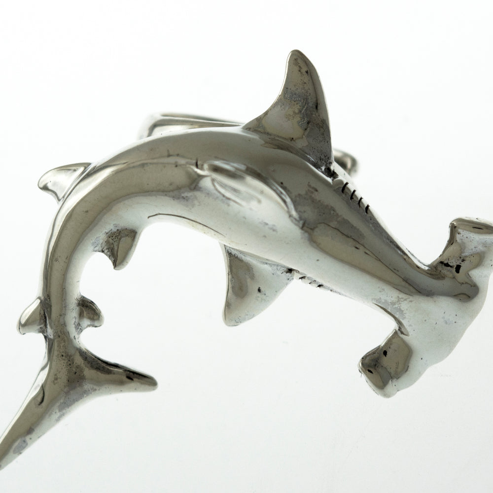 An artisan-made Hammerhead Shark Ring on a white background.
