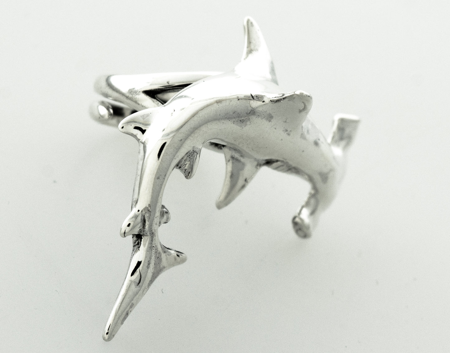 
                  
                    A sterling silver Hammerhead Shark Ring, specifically depicting a hammerhead.
                  
                