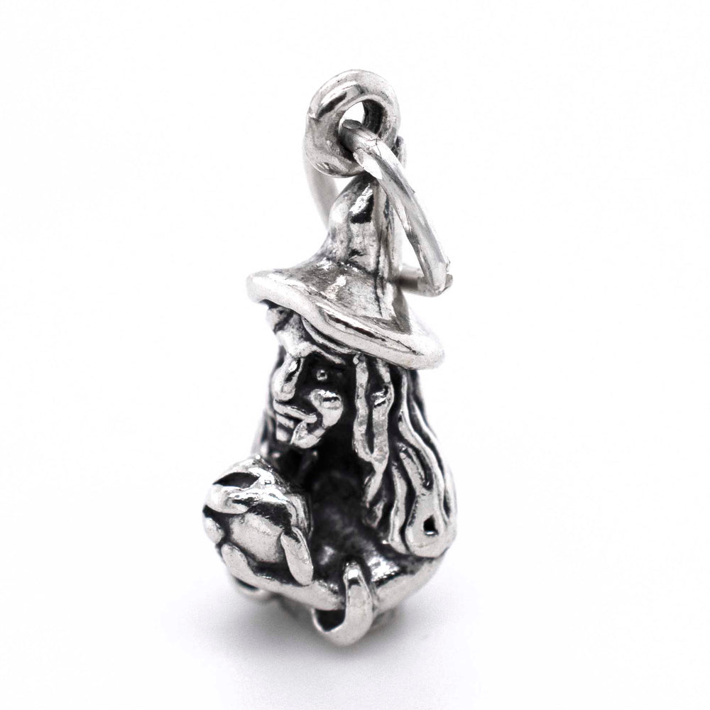 
                  
                    A Super Silver Witch with Crystal Ball Charm for a charm bracelet, featuring a witch in a hat holding a crystal ball.
                  
                