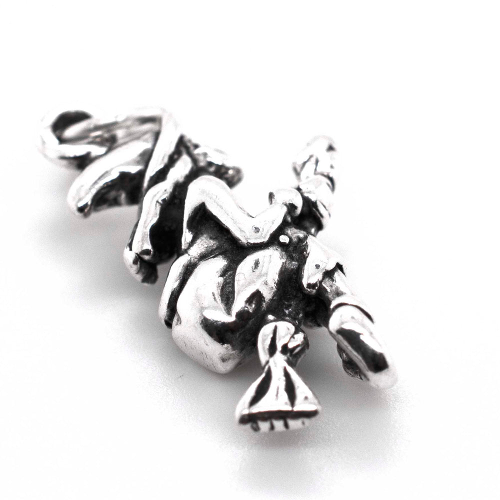 
                  
                    A Super Silver Witch on a Broomstick Charm, perfect for any witchy ensemble.
                  
                