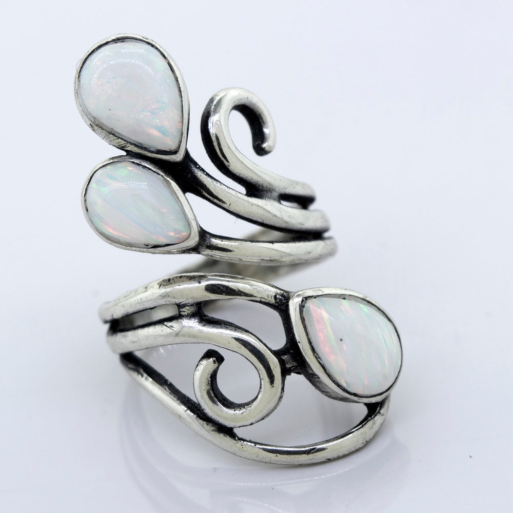 
                  
                    A Super Silver Stunning Wrap-Around Opal Ring, handcrafted with swirls in silver.
                  
                