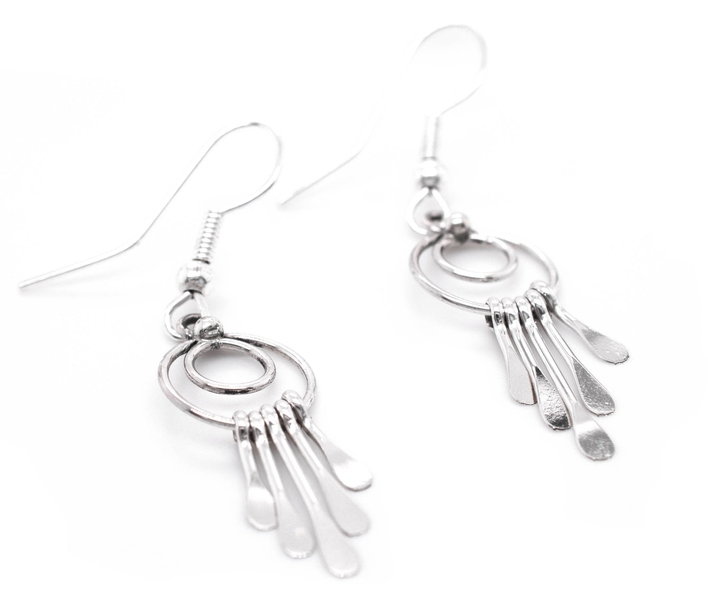 Super Silver's Zuni Silver Waterfall Earrings, handmade Native American earrings with southwest charm, dangling gracefully on a white background.