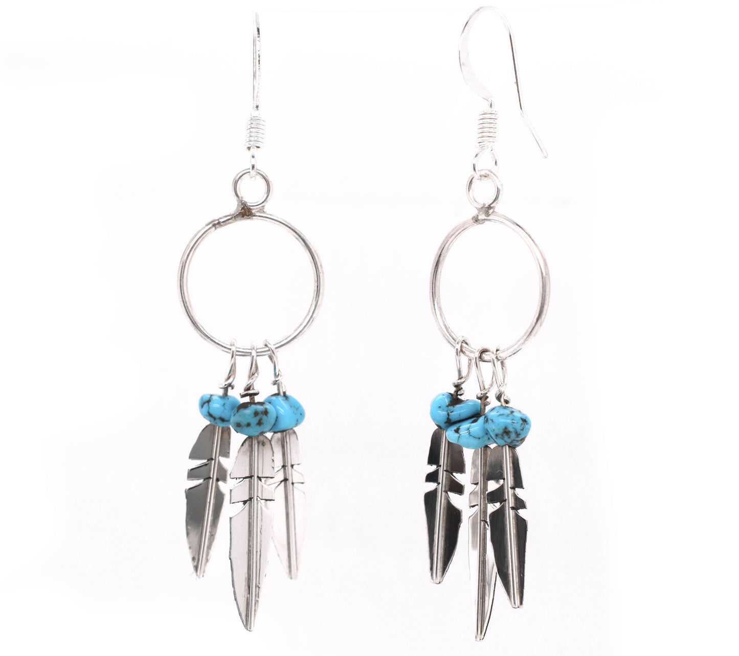 
                  
                    A pair of silver earrings with Enchanting Zuni Feather Earrings With Coral Or Turquoise Beads and feathers from Super Silver.
                  
                