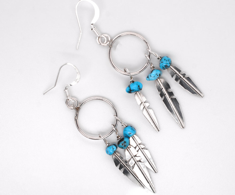 
                  
                    Enchanting Zuni Feather Earrings With Coral Or Turquoise Beads
                  
                