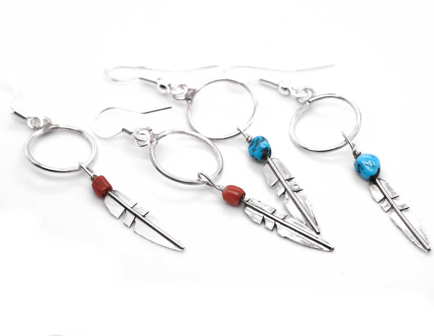 Super Silver's Delicate Zuni Feather Earrings with Coral and Turquoise Beads featuring turquoise accents.