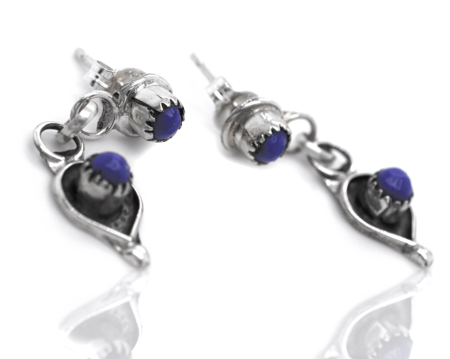 
                  
                    Delicate Zuni Lapis And Coral Earrings, crafted with .925 sterling silver and adorned with lapis stones by Super Silver.
                  
                