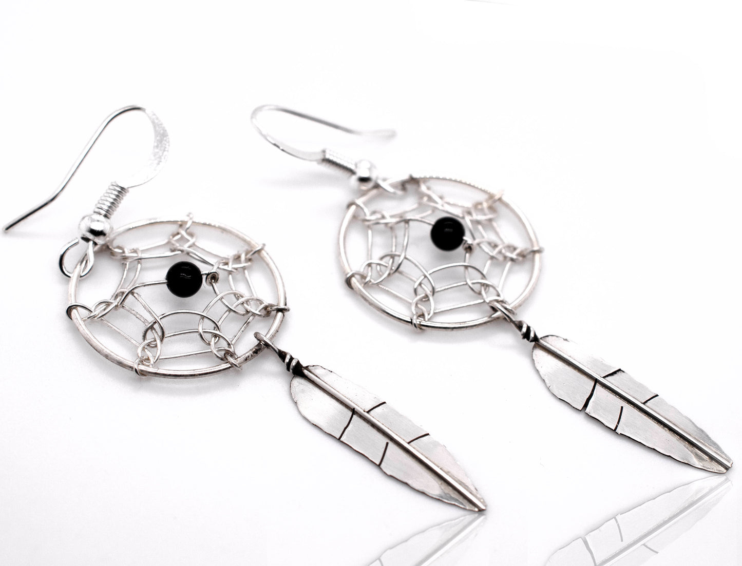 
                  
                    A pair of Zuni Dreamcatcher Earrings with Natural Stone Bead from Super Silver
                  
                