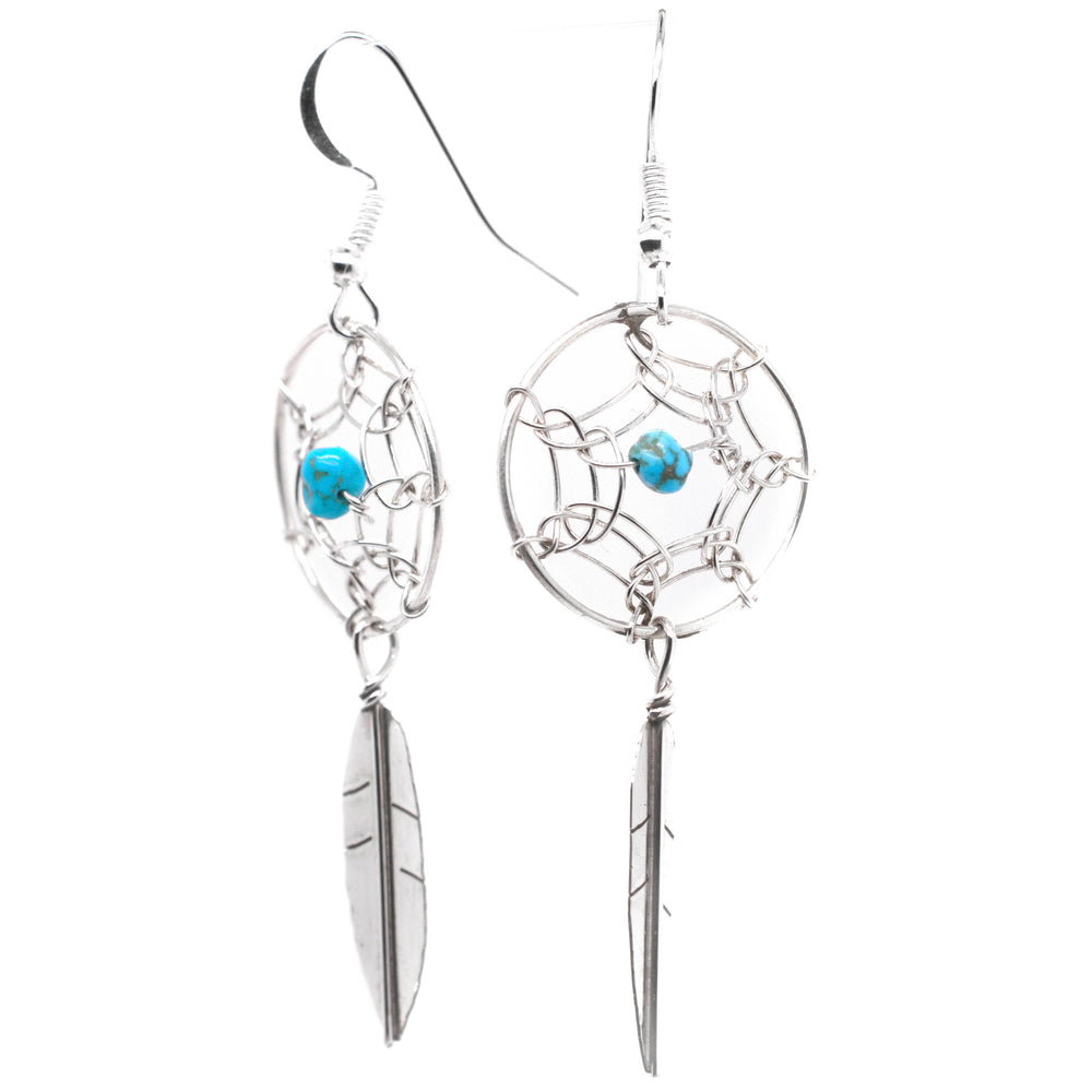 A pair of Super Silver Zuni Dreamcatcher Earrings with Natural Stone Bead.