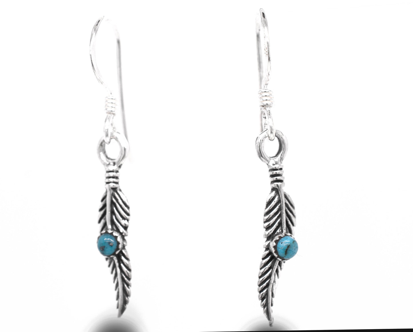 
                  
                    A stunning pair of Super Silver delicate feather earrings adorned with vibrant turquoise stones.
                  
                